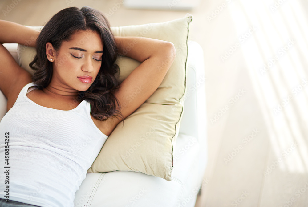 When all else fails, take a nap. Shot of a young woman asleep on her sofa.