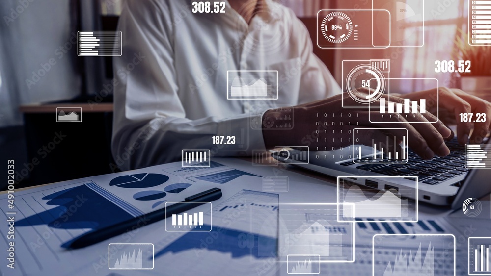 Businessman accountant or financial expert analyze business report graph and finance chart at corpor