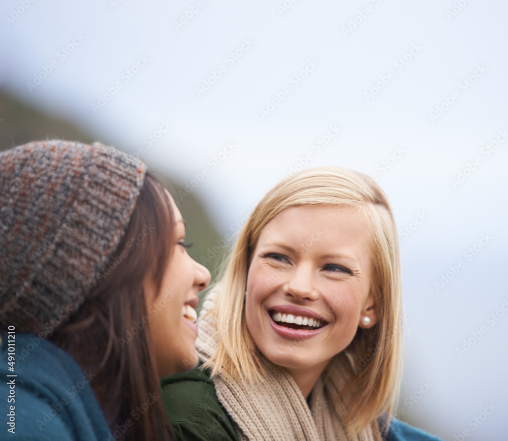 Precious moments with my best friend. Two young women sitting together outside.