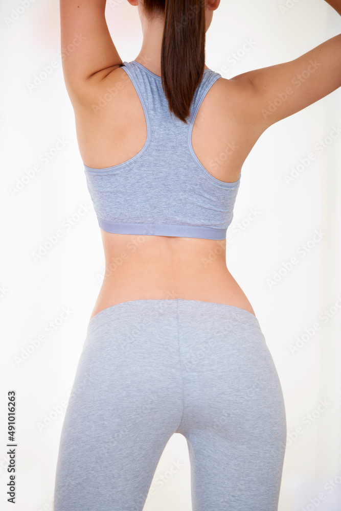 Perfection. Rearview of an attractive young woman in gymwear.