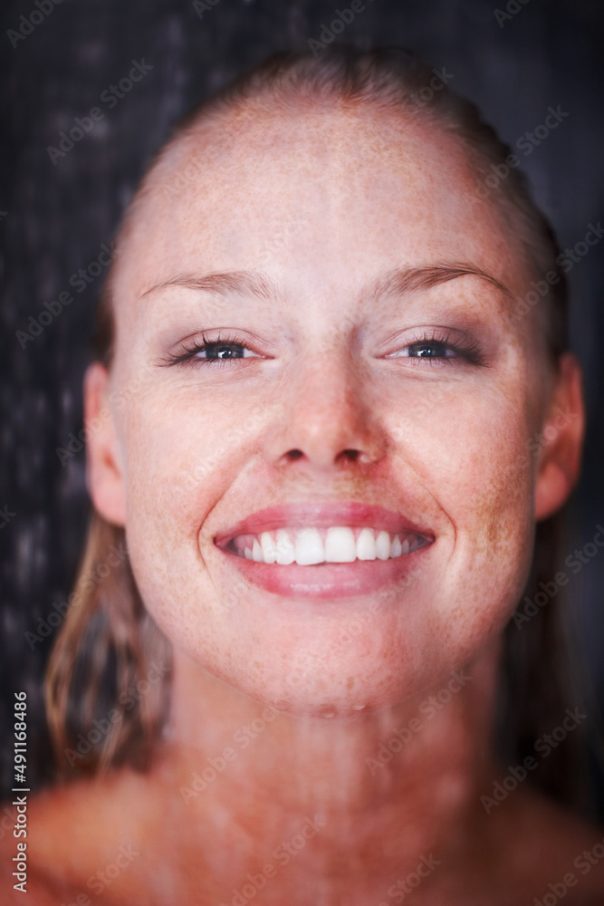 Closeup of a happy female enjoying a bath. Closeup portrait of a smiling female woman enjoying a bat