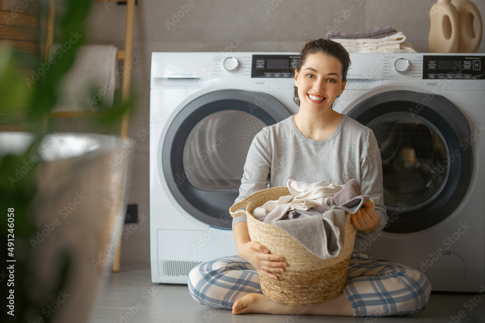 woman is doing laundry