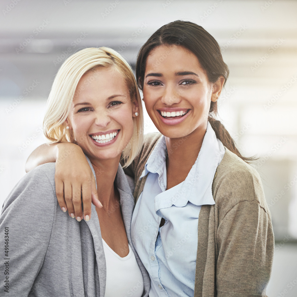 Shes the best. Cropped portrait of two businesswomen standing in the office.