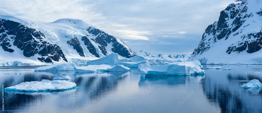 Crusing the Lemaire Channel among drifting icebergs, Antarctic Peninsula. Antarctica