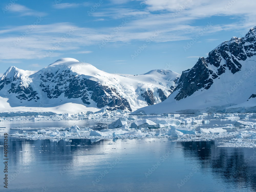 Crusing the Lemaire Channel among drifting icebergs, Antarctic Peninsula. Antarctica