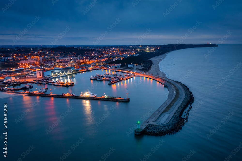 Aerial landscape of harbor in Wladyslawowo by the Baltic Sea at dusk. Poland.