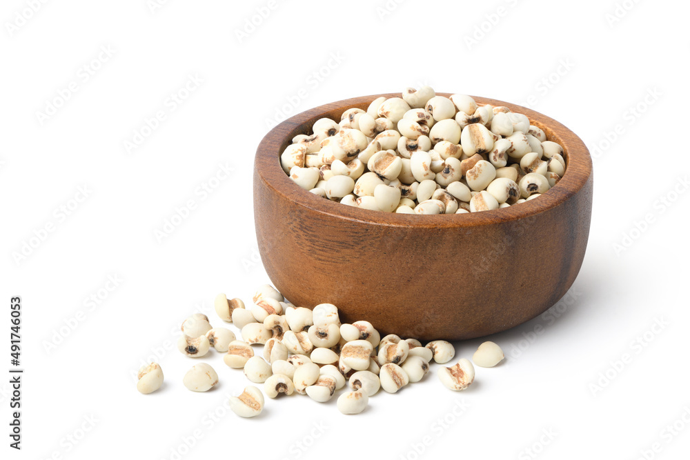 Jobs tears ( Adlay millet) in wooden bowl  isolated on white background.