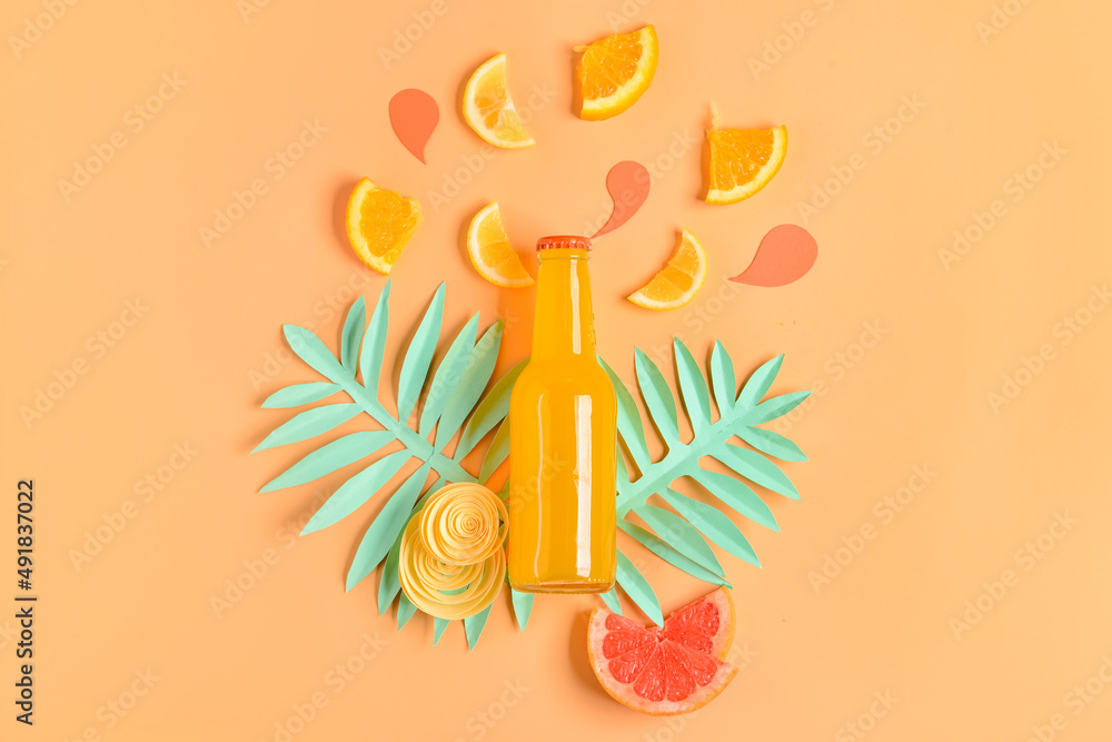 Composition with bottle of fresh soda on orange background