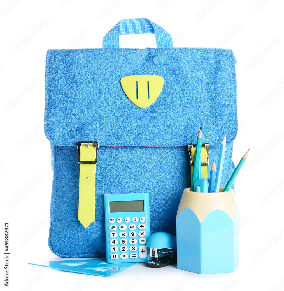 School backpack and stationery isolated on white background