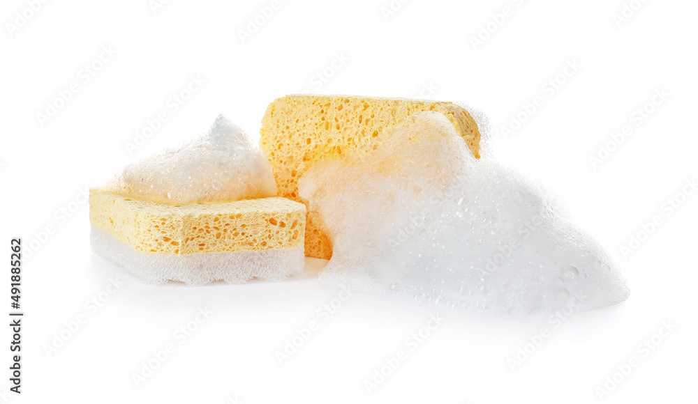 Soapy sponges with foam on white background