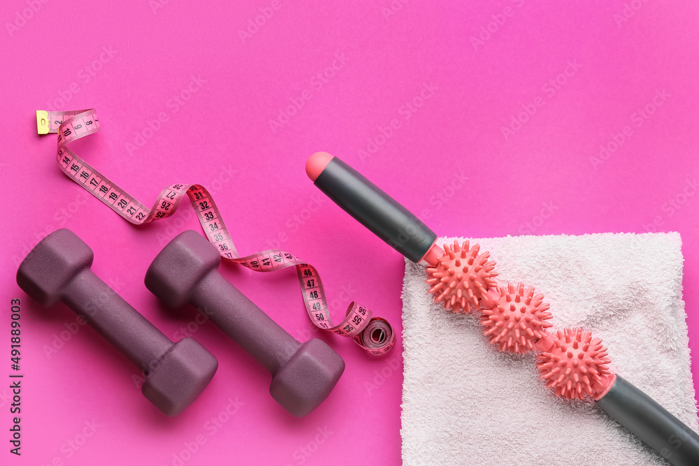 Stylish sport equipment on pink background