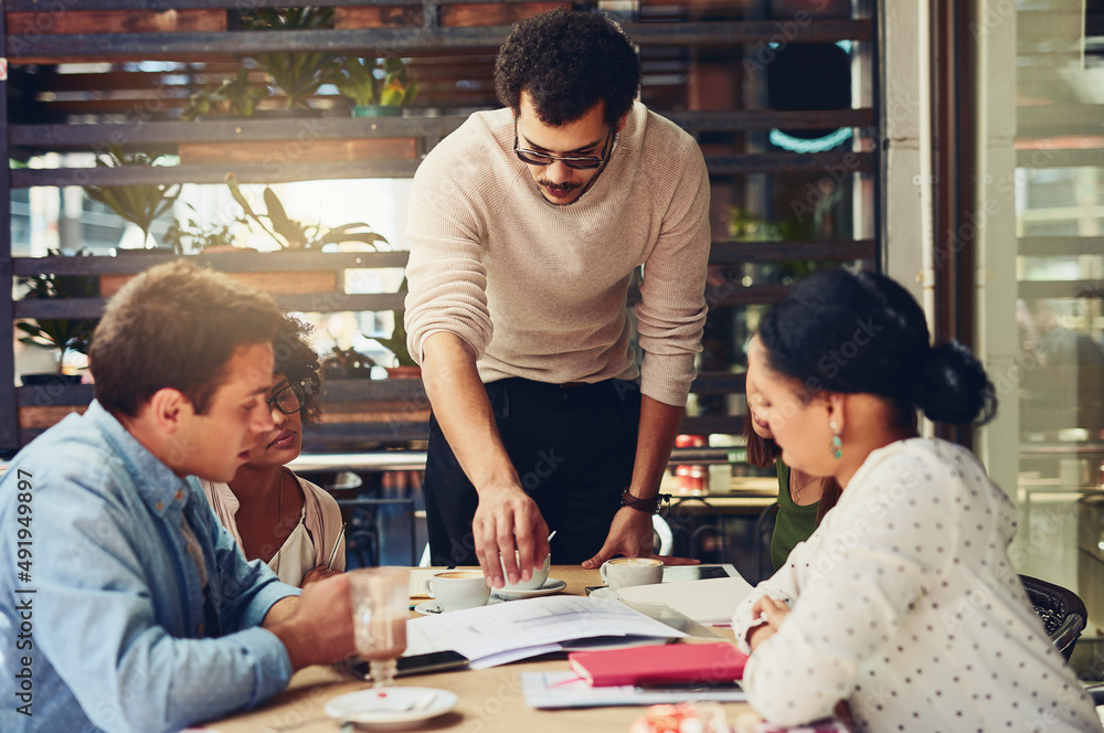 Working on these stats together will make it better. Cropped shot of designers having a meeting at a