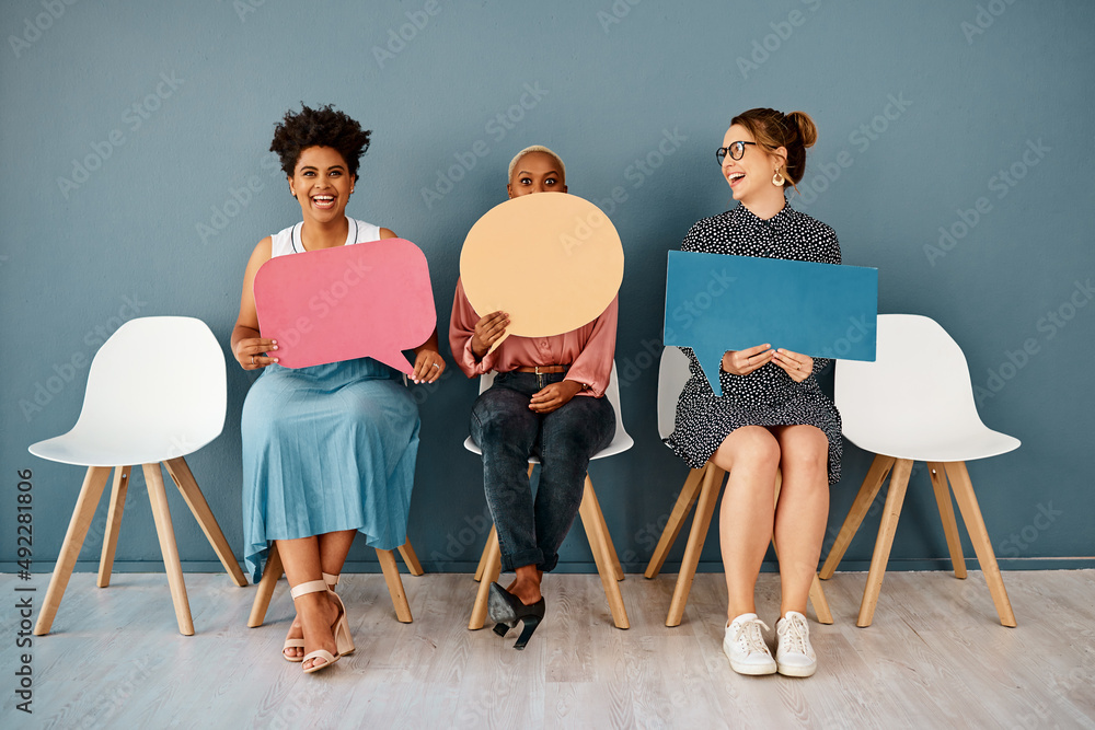 I think I shouldnt have said that. Studio shot of a group of attractive young businesswomen holding 