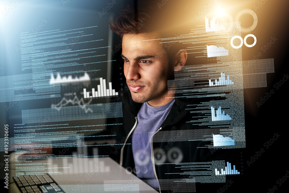 Working on some new code. Cropped shot of a handsome young male computer programmer working on new c