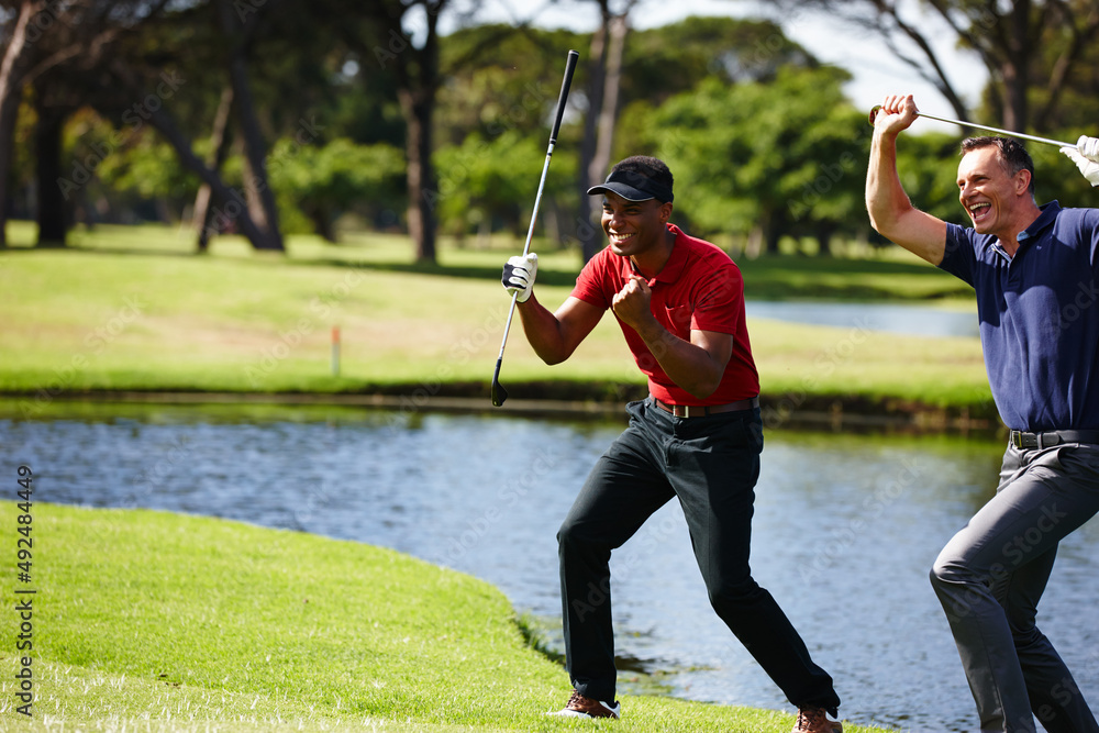 That one in a million shot. Shot of two golfers celebrating a great shot.