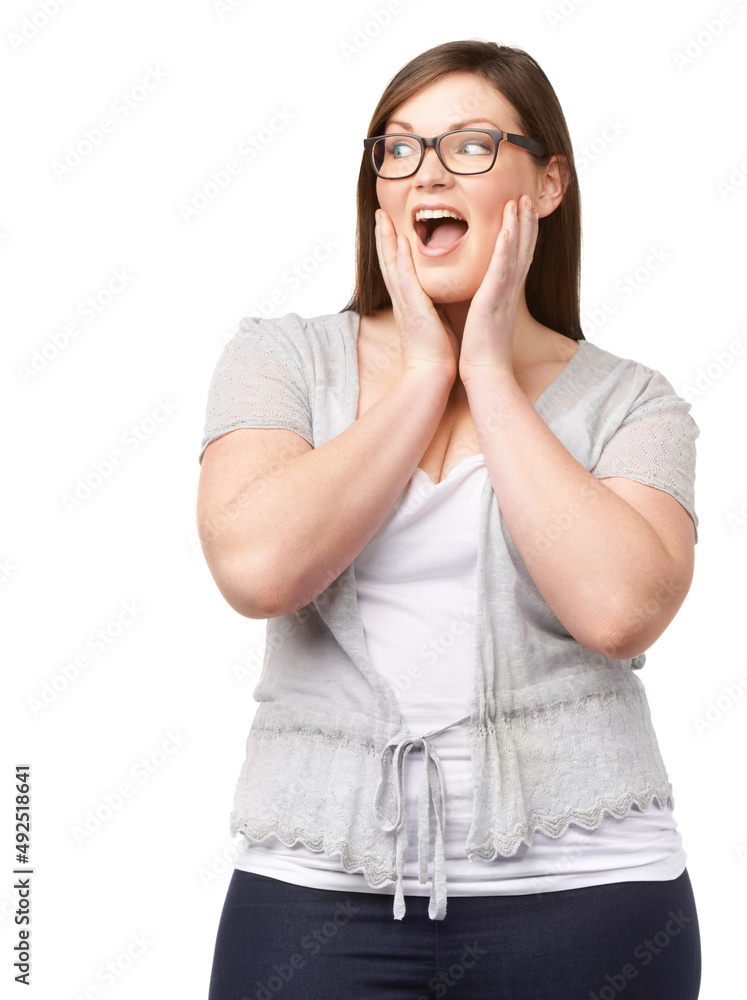 Oh, what a deal. A full-figured woman looking at something with shock while isolated on white.