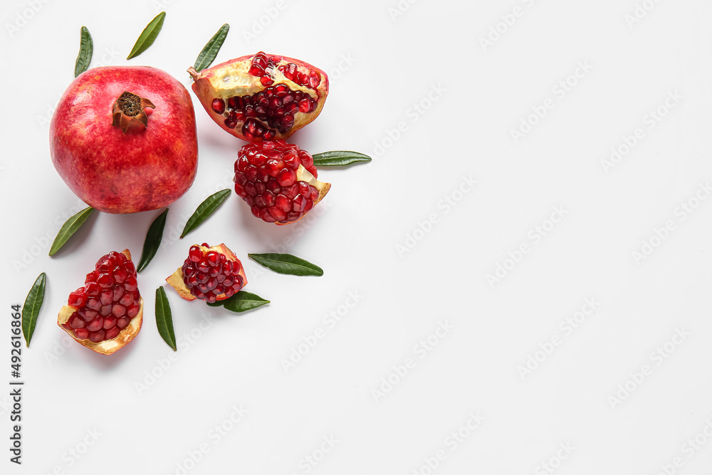 Beautiful composition with pomegranate on white background