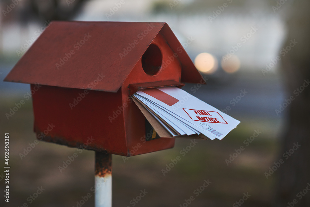 Messages in a mailbox. Cropped shot of letters in a letter box.