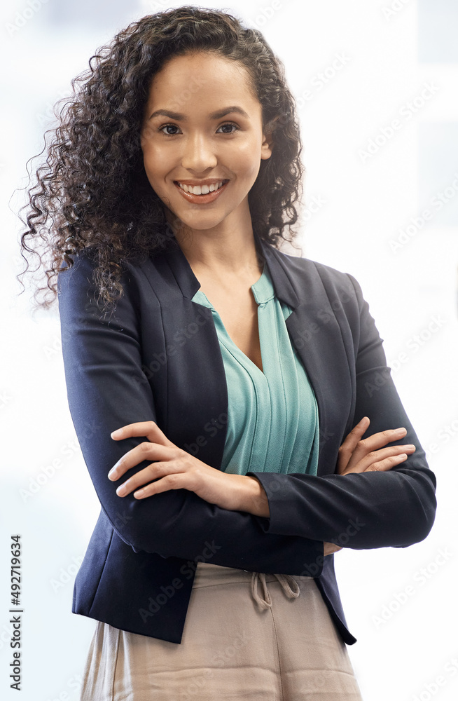 Confidence is an important part of success. Cropped portrait of an attractive young businesswoman st