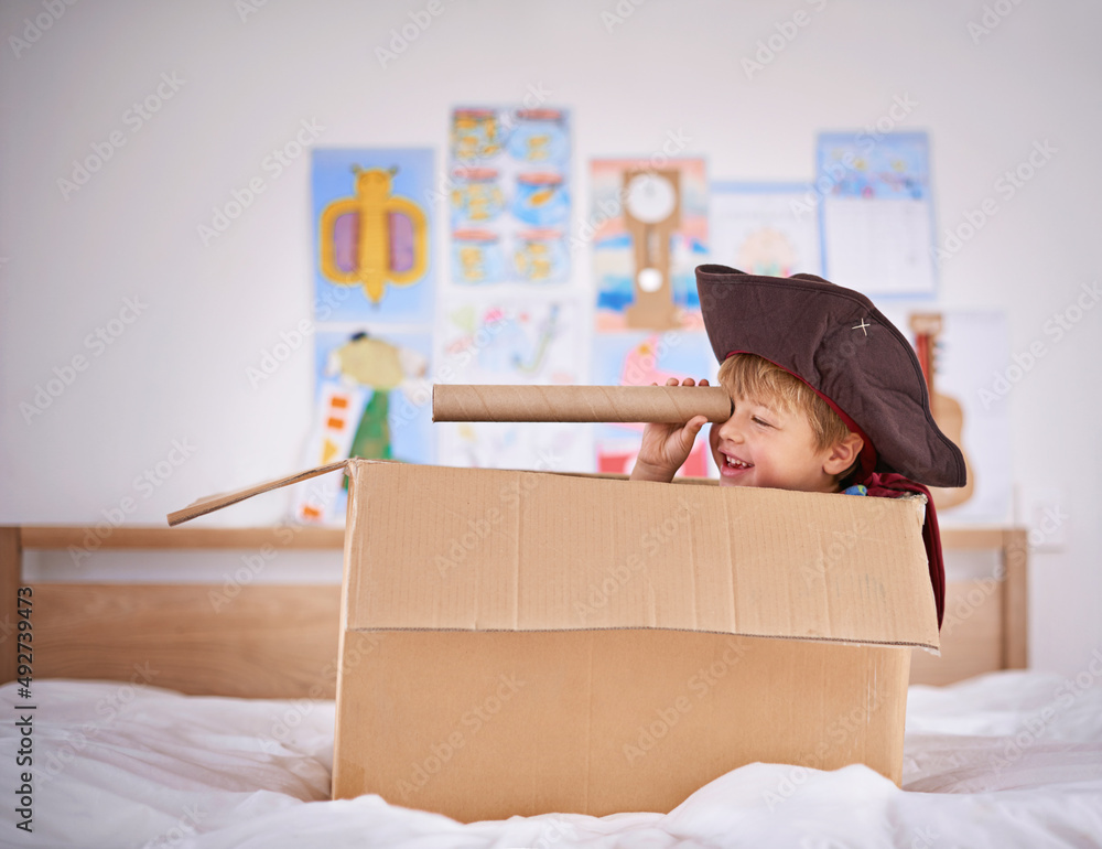 Thar she blows. Shot of a young boy playing make believe as a pirate.