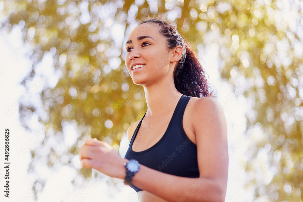 Dont consider yourself a morning personHeres the solution. Shot of a sporty young woman out for a ru