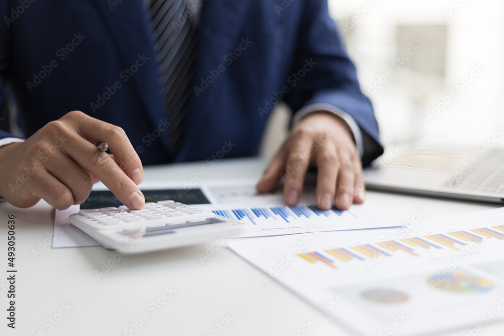 Businessman accountant or banker making calculations. Business Financing Accounting Banking Concept