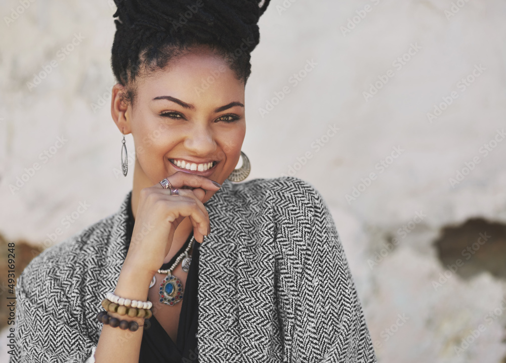 I eat glitter for breakfast and shine all day. Cropped shot of a fashionable young woman posing outd