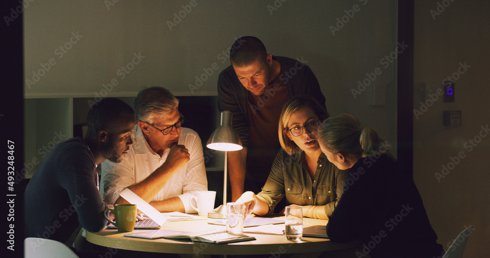 The way forward, is together. Cropped shot of a group of businesspeople working together around a ta