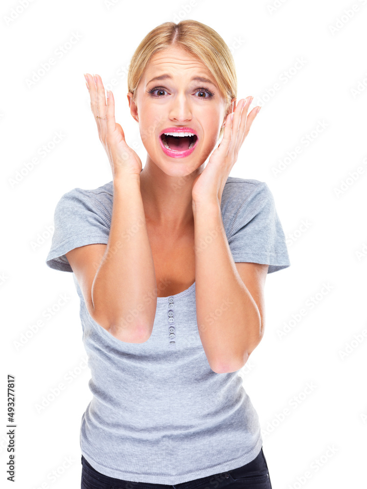 Aah What am I going to do. Studio portrait of a young woman looking afraid against a white backgroun