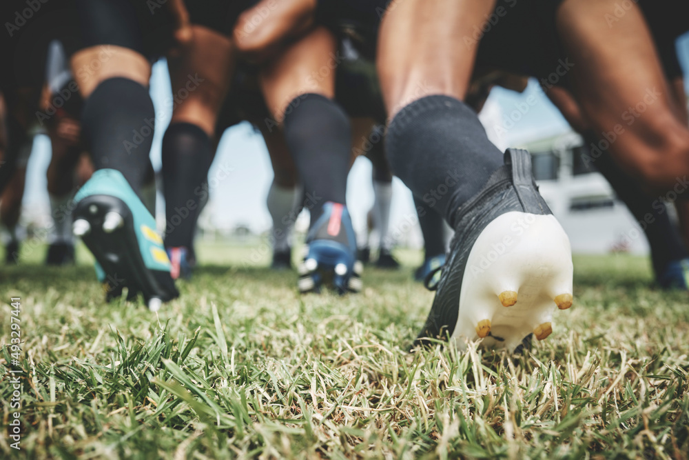 All together now. Low angle shot of two unrecognizable rugby teams competing in a scrum during a rug