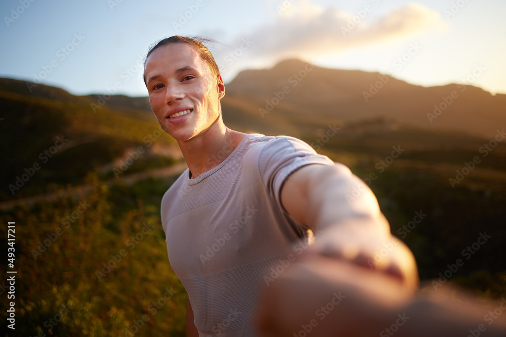 Well done weve gotten this far. Shot of a young man taking a break during his workout.