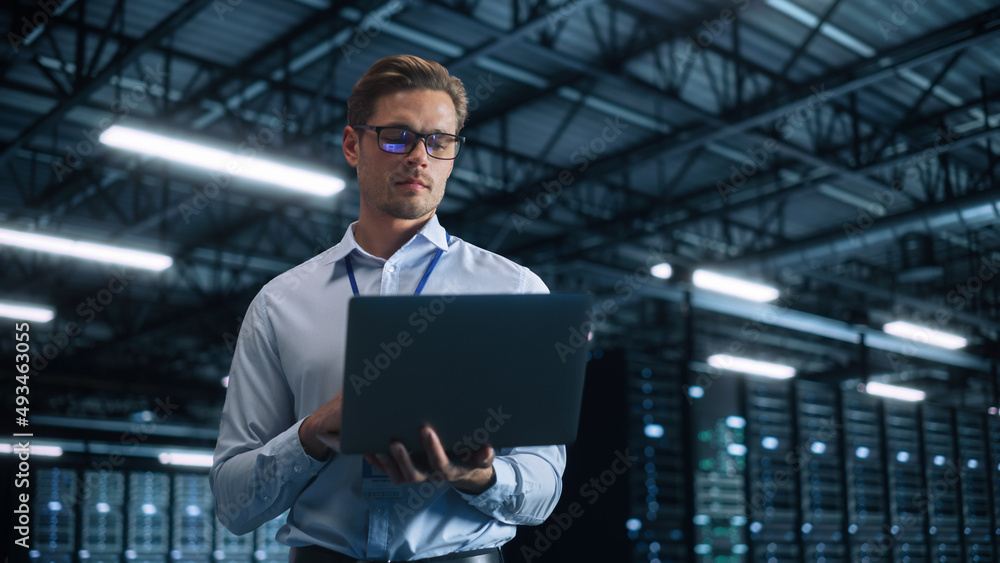 Portrait View of Caucasian Software Engineer Standing and Looking at the Camera While Thinking About