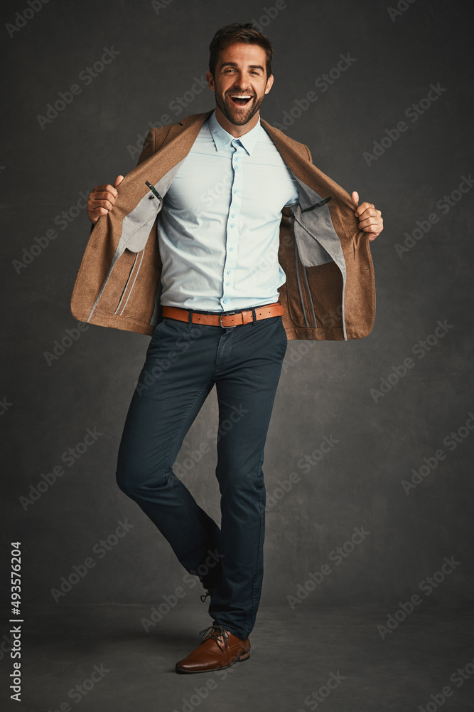 Always dress like its the best day of your life. Studio shot of a handsome young man posing against 