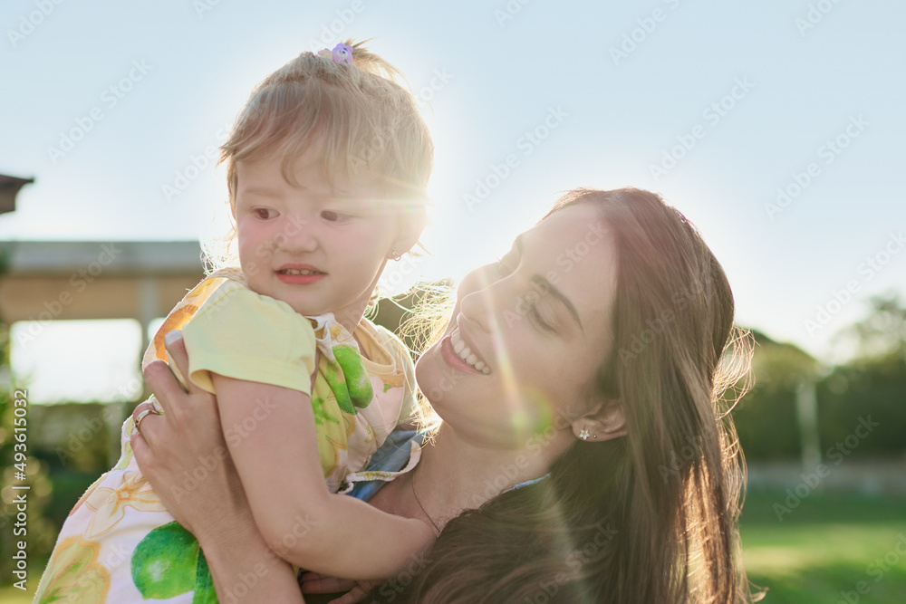 My daughter instantly brightens all of my days. Shot of a mother bonding with her little daughter ou