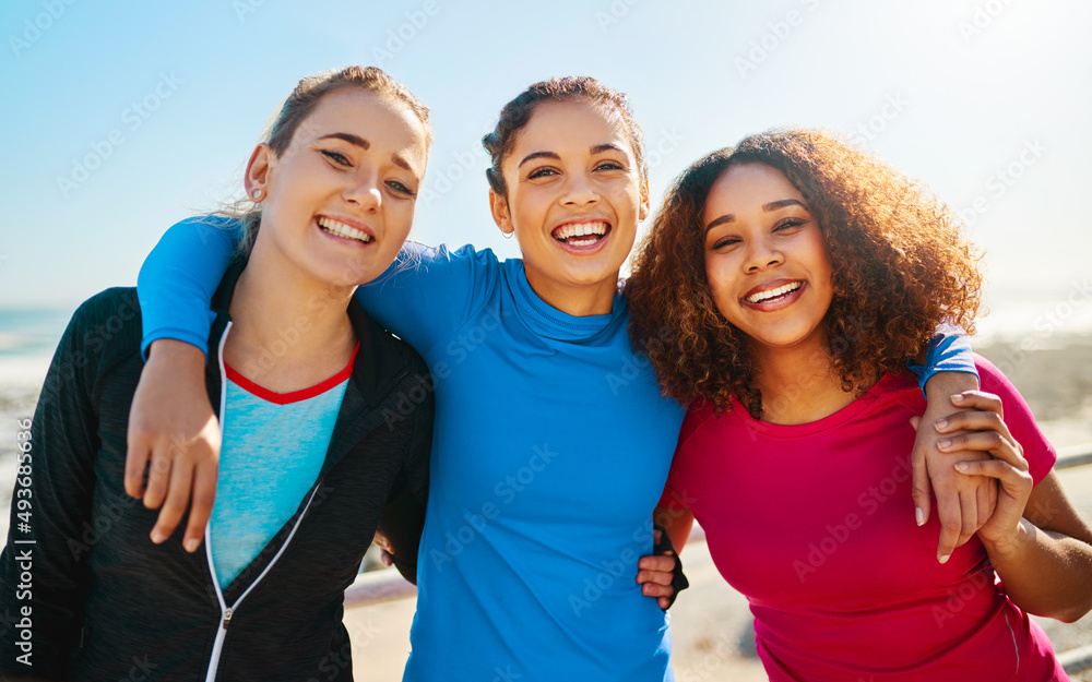 Together we will get trough today. Portrait of a group of young cheerful friends hanging out togethe