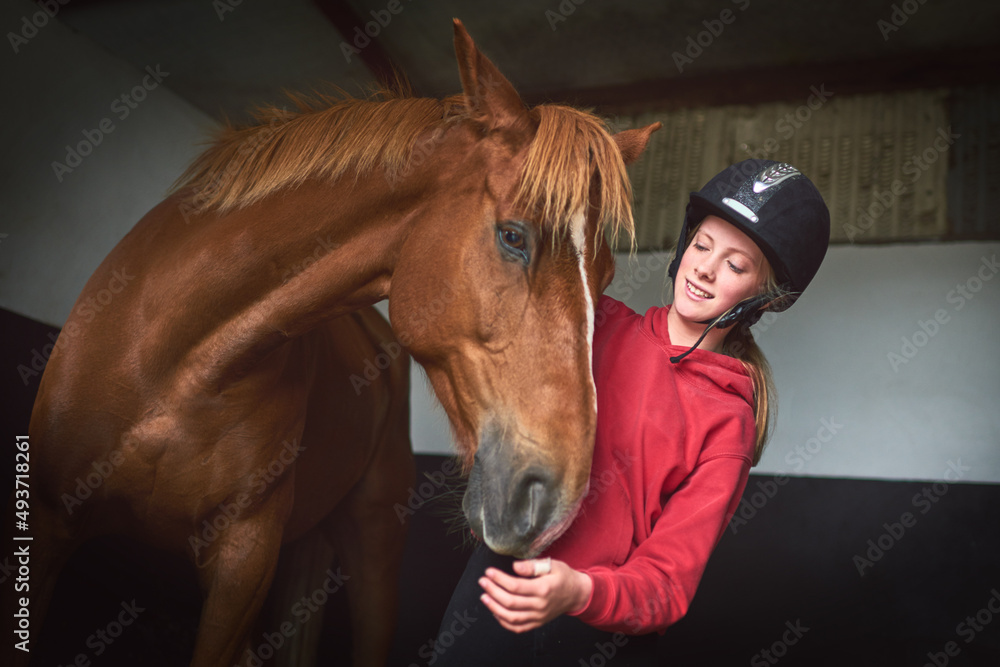 No bond more truer. Shot of a teenage girl bonding with her horse.