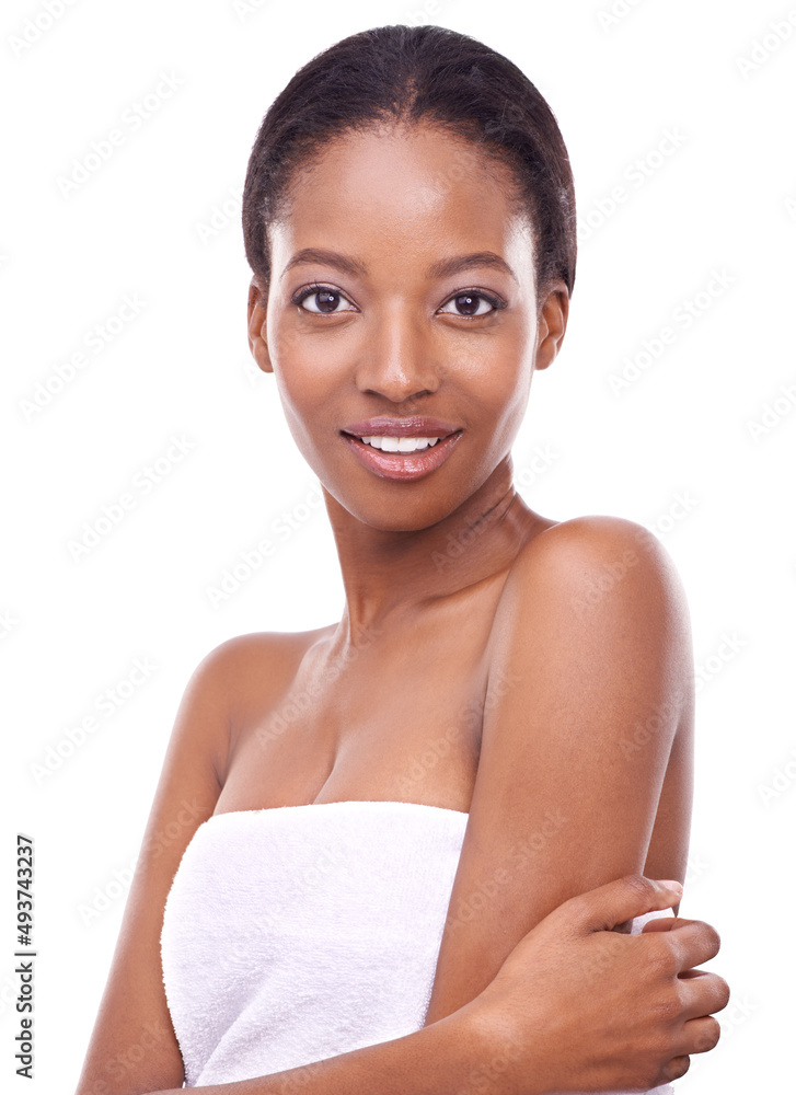 Flawless beauty. Studio shot of a beautiful young woman touching her skin.