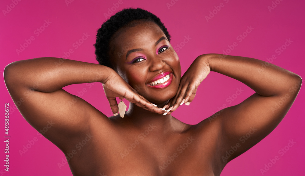 Youll see the world differently if you just smile.. Studio shot of a beautiful young woman posing ag