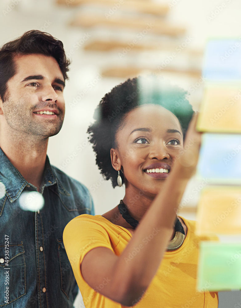 The prospects of success are looking positive. Cropped shot of coworkers brainstorming in a modern o