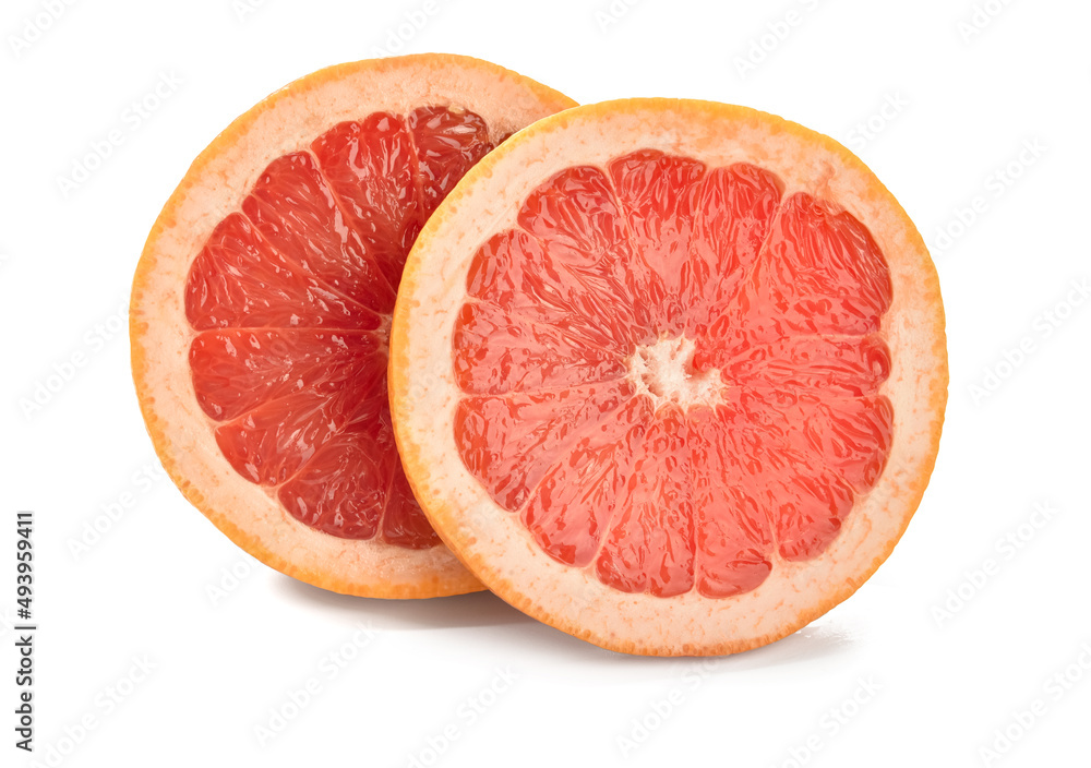 Slices of tasty ripe grapefruit on white background