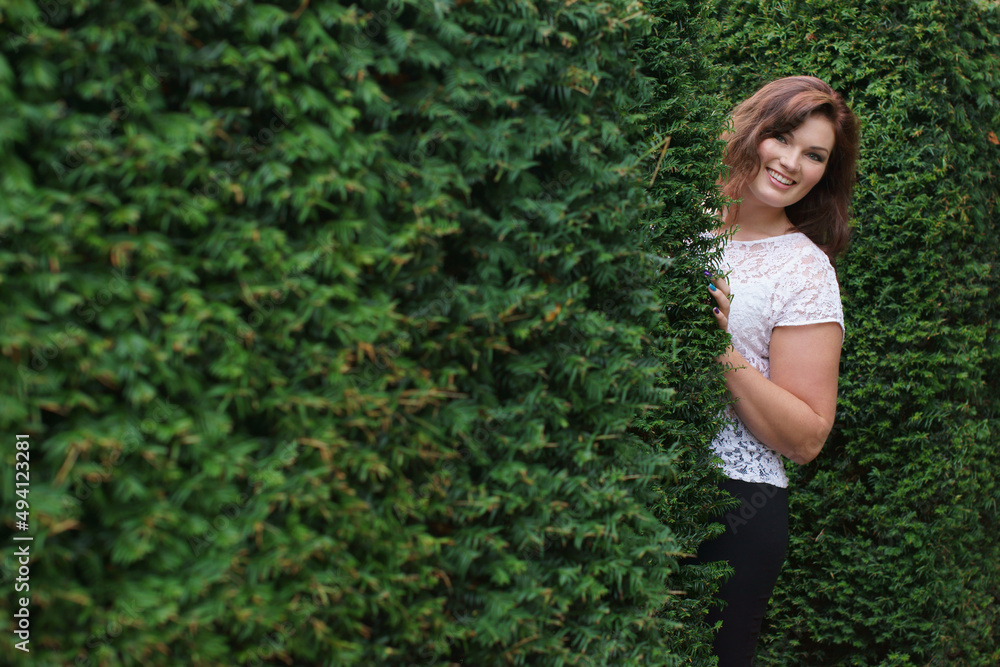 Playful in the park. Shot of an attractive young woman enjoying a day in the park.