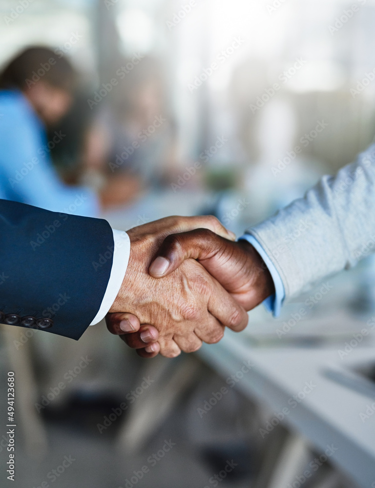 Win-win business deals are the way to go. Cropped shot of two businessmen shaking hands during a mee