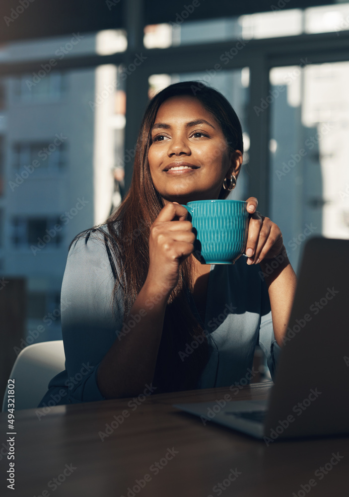 She has clear ideas of what success means to her. Shot of a young businesswoman looking thoughtful w