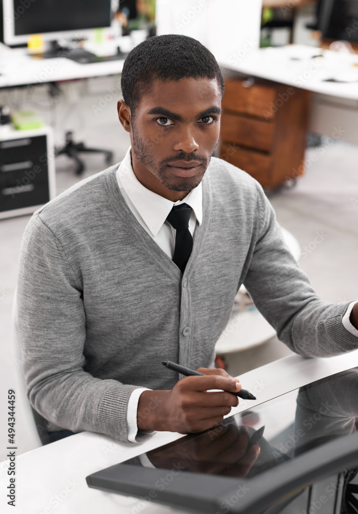 Smart technology makes everything easier. A young man working on a large touchscreen.