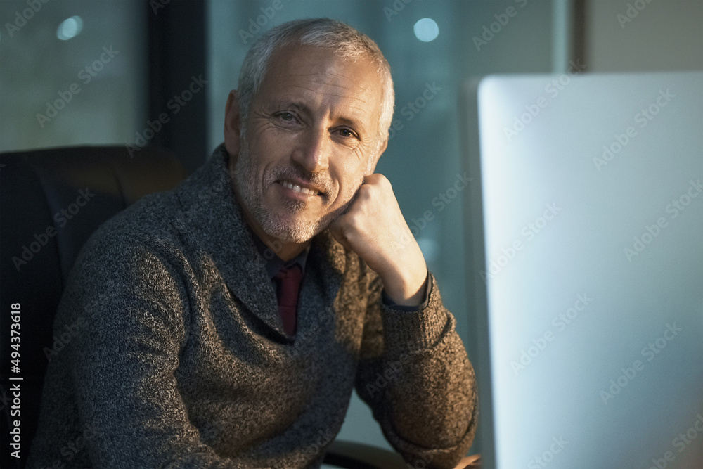 Success is worth all the late nights Ive stayed up. Cropped portrait of a mature businessman working