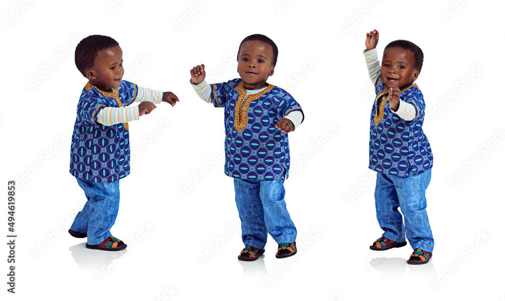 Doing the baby boogy. Composite image of an adorable african toddler dancing.