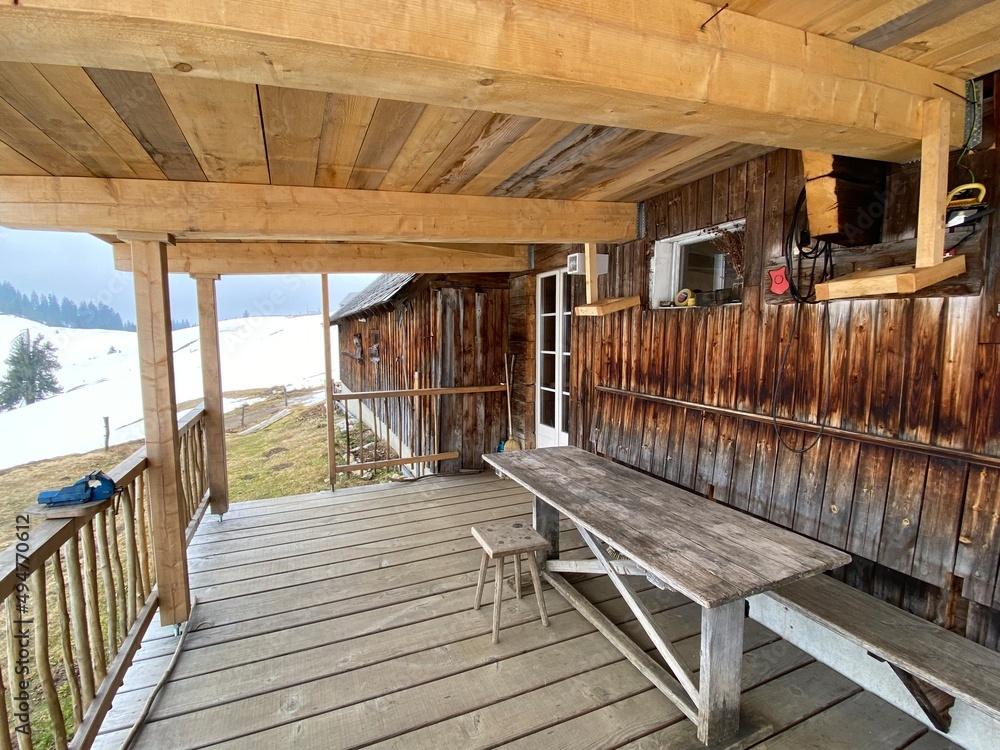 Mountain huts (chalets) or farmhouses and old wooden cattle houses in the valley of Wägital or Waegi