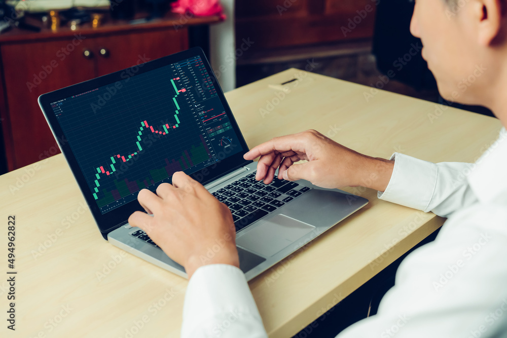 Stock market data chart analysis by ingenious computer software . Investment application display sto