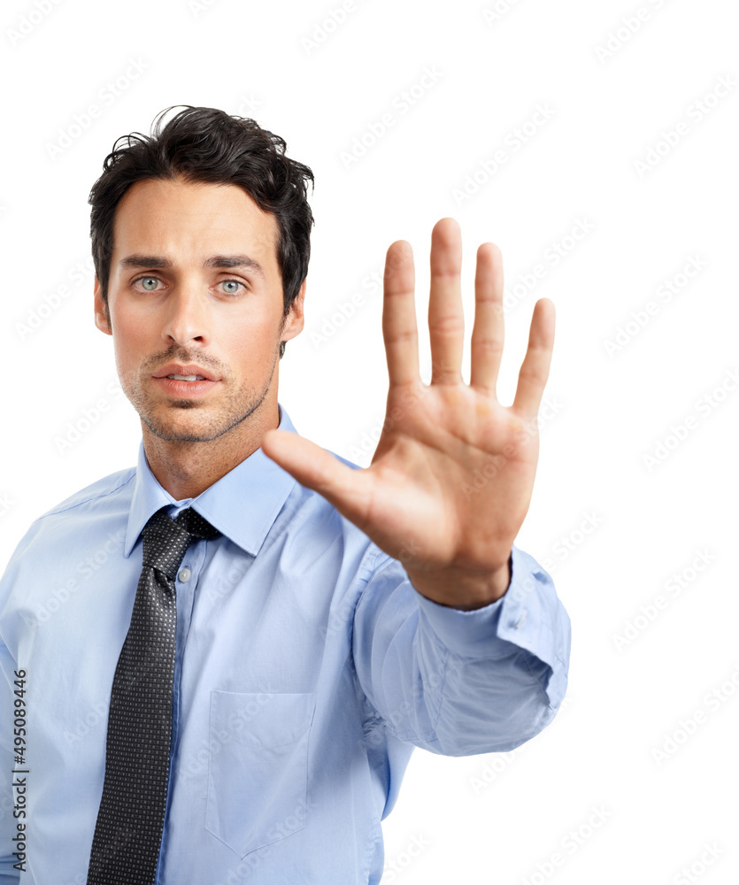 Stop right there. Studio shot of a young businessman showing a stop gesture.