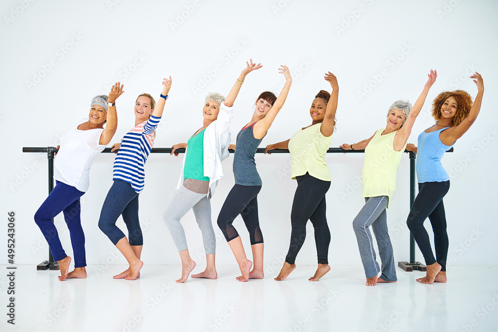 Having fun with exercise. Shot of a group of women working out indoors.